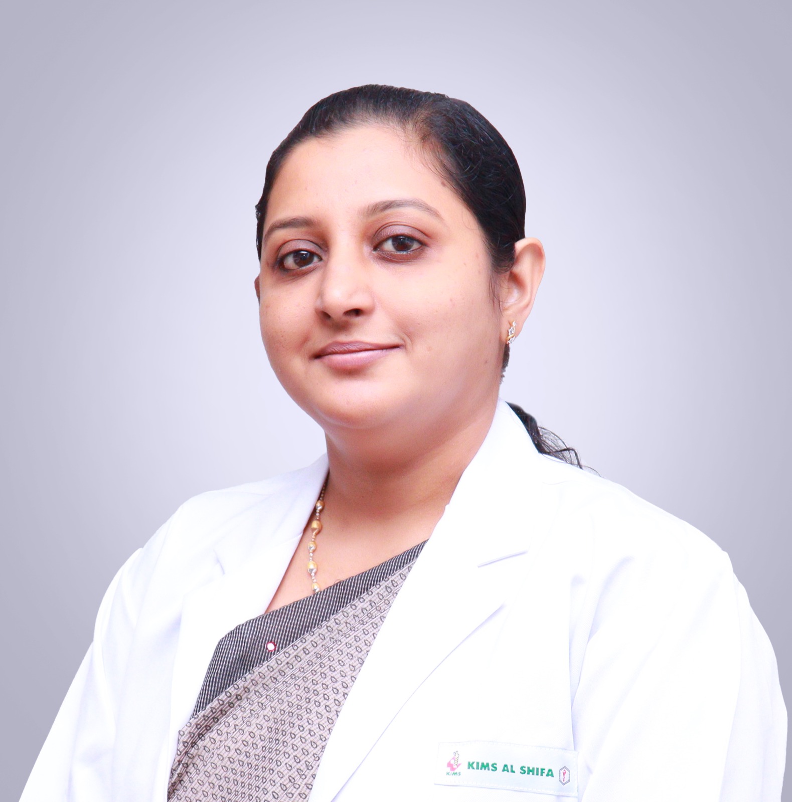 Dr. Nisha  S